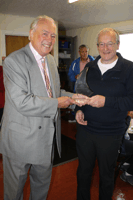 Calum Robertson receiving Trophy from John Cooper